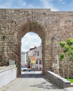 Majestic stone archway of the Valens Aqueduct, a Roman aqueduct, was the major water providing system of the Eastern Roman capital of Constantinople, located in the Fatih district of Istanbul, Turkey