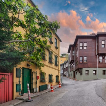 Colorful residential buildings painted in vibrant colors, at an alleys of Kuzguncuk neighborhood, Uskudar district, Istanbul, Turkey before sunset