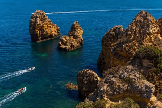 Lagos, Portugal - 25 August 2025: Tourists visiting Ponta da Piedade, in Lagos. Algarve, Portugal