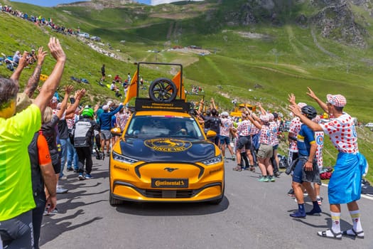 Col du Tourmalet, France - July 06 2023: Caravan car at the top of the Col du Tourmalet in Pyerenees mountains during the stage 6 of Le Tour de France 2023