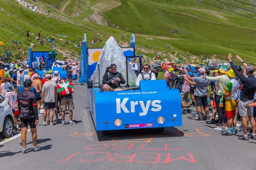 Col du Tourmalet, France - July 06 2023: Caravan car at the top of the Col du Tourmalet in Pyerenees mountains during the stage 6 of Le Tour de France 2023