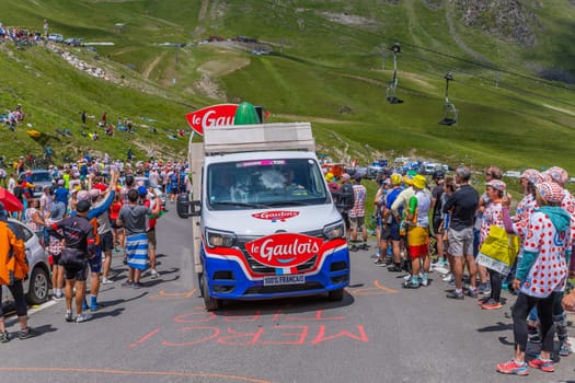 Col du Tourmalet, France - July 06 2023: Caravan car at the top of the Col du Tourmalet in Pyerenees mountains during the stage 6 of Le Tour de France 2023