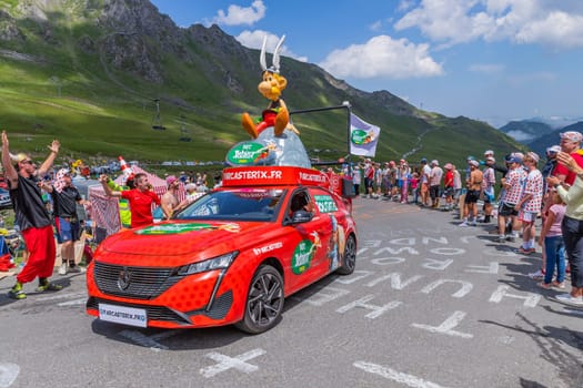 Col du Tourmalet, France - July 06 2023: Caravan car at the top of the Col du Tourmalet in Pyerenees mountains during the stage 6 of Le Tour de France 2023