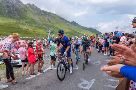 Col du Tourmalet, France - July 06 2023: Riders climbig the road to Col du Tourmalet in Pyerenees mountains during the stage 6 of Le Tour de France 2023.