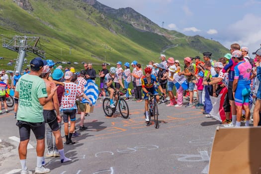 Col du Tourmalet, France - July 06 2023: Riders climbig the road to Col du Tourmalet in Pyerenees mountains during the stage 6 of Le Tour de France 2023.