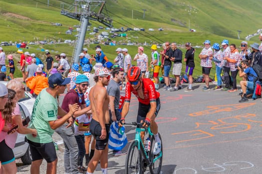 Col du Tourmalet, France - July 06 2023: Warren Barguil climbig the road to Col du Tourmalet in Pyerenees mountains during the stage 6 of Le Tour de France 2023.