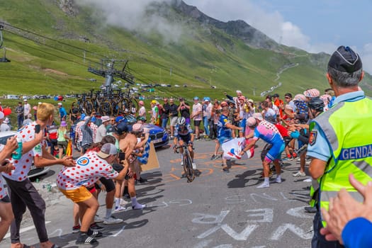 Col du Tourmalet, France - July 06 2023: Julian Alaphilippe climbig the road to Col du Tourmalet in Pyerenees mountains during the stage 6 of Le Tour de France 2023.
