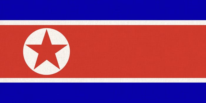 Flag of North Korea. North Korea state symbol. flag of Democratic People Republic of Korea on fabric surface. Fabric Texture. Korean state symbol. Asian country. State symbol of Northern Korea