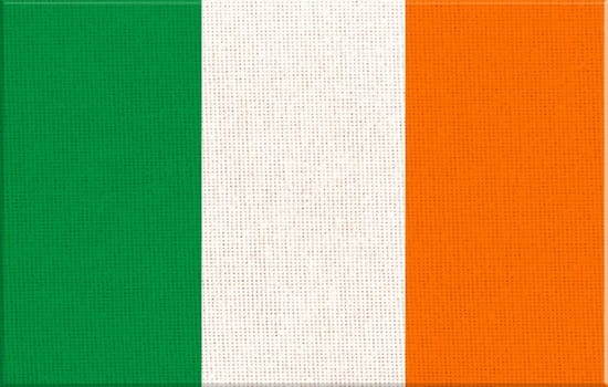 Flag of Ireland. Irish flag on fabric surface. Irish national flag on textured background. Fabric Texture. Republic of Ireland. European country. State symbol of Ireland