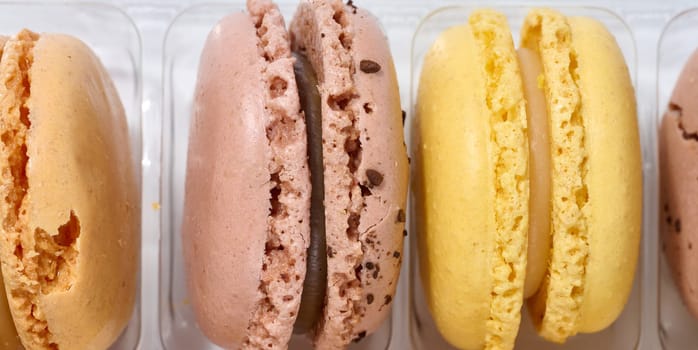 Assortment of colorful macarons, top view