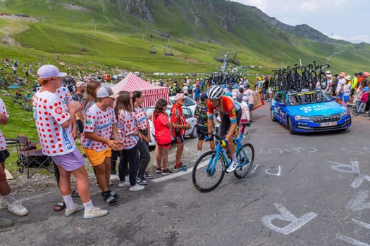Col du Tourmalet, France - July 06 2023: Alex Kirsch climbig the road to Col du Tourmalet in Pyerenees mountains during the stage 6 of Le Tour de France 2023.