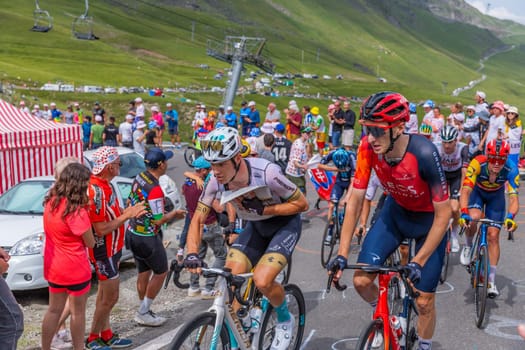 Col du Tourmalet, France - July 06 2023: Riders climbig the road to Col du Tourmalet in Pyerenees mountains during the stage 6 of Le Tour de France 2023.