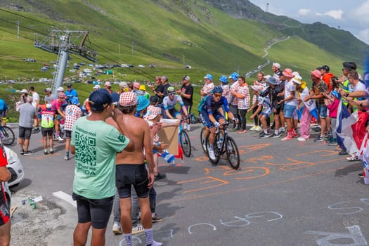 Col du Tourmalet, France - July 06 2023: Riders climbig the road to Col du Tourmalet in Pyerenees mountains during the stage 6 of Le Tour de France 2023.