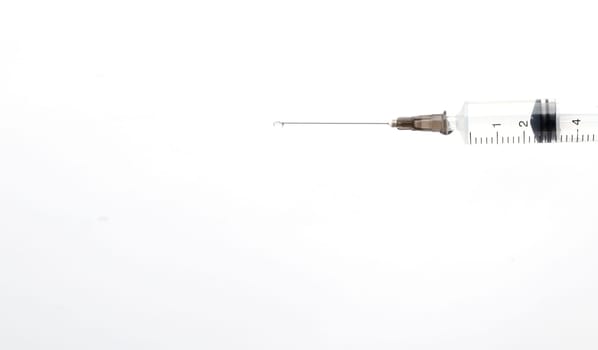 injection syringe with medicine on white background. selective focus. isolated on white background