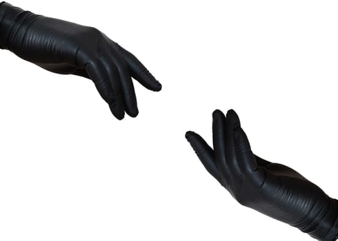 Two hands in sterile gloves stretch to each other. Hands in black nitrile gloves. Skin protection during epidemics and quarantine. There is a place for text. High quality photo