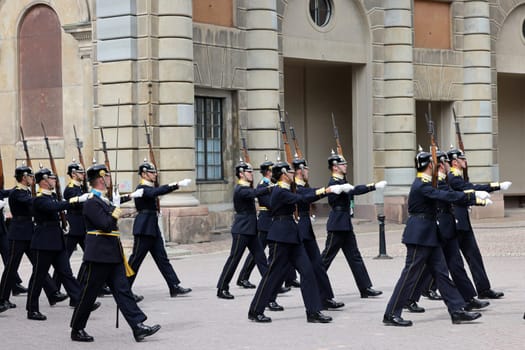 Stockholm, Sweden - June 26, 2023: Changing of the Guard ceremony at the Royal Palace in Stockholm, Sweden