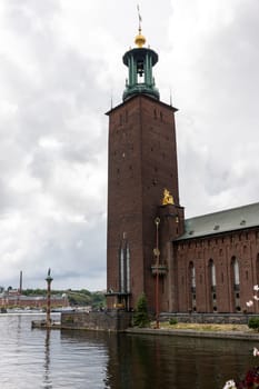 Stockholm, Sweden - July 25, 2023: Stockholm City Hall is the building of the Stockholm City Council in Sweden. It is located on Kungsholmen Island on the edge of Lake Mlar. Designed by architect Ragnar stberg