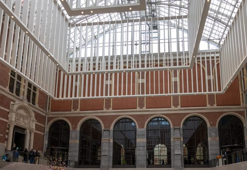 Amsterdam, Netherlands - April 21, 2023: Rijksmuseum, the original interior courtyards have been redesigned to create the imposing new entrance space of the Atrium. Amsterdam, Netherlands