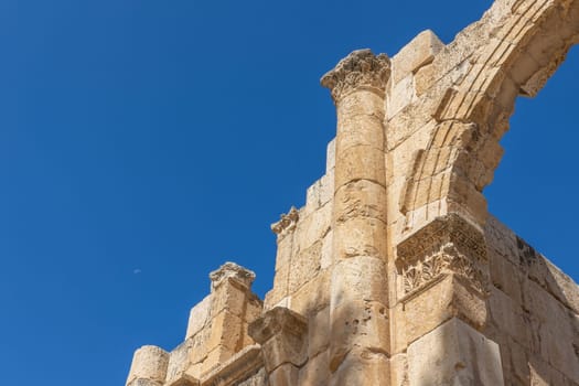 Gate South with blue sky in the background at ruins of Jerash archaeological site. Jordan.