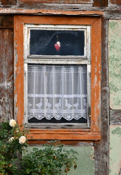 empty half-timbered house with panel curtains