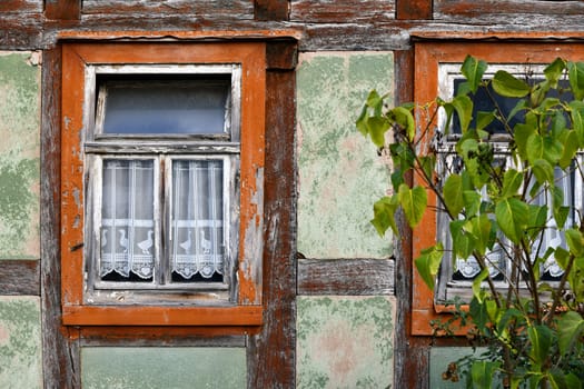 empty half-timbered house with panel curtains
