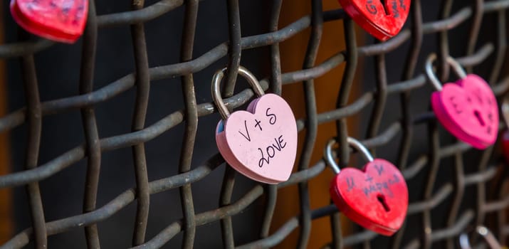 Verona, Italy - June 2022: love locks, concept for engagement, happiness, marriage and romantic relationship