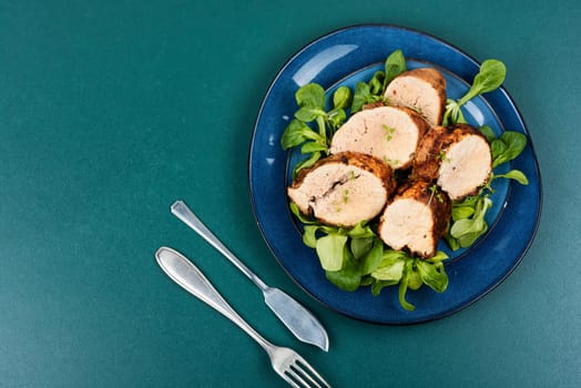 Roasted cod roe on a plate. Seafood and fish dishes.