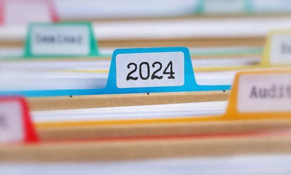 File folders with a tab labeled 2024