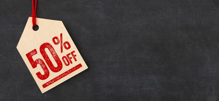 Tag on a blackboard - 50 percent off