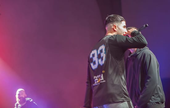Merida, Spain - Dec 9th, 2022: Rap battling performance, Merida, Spain. Judge at bottom