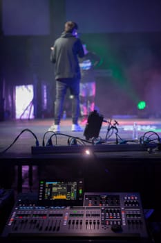 Merida, Spain - Dec 9th, 2022: Rap battling performance. Mixing console in focus