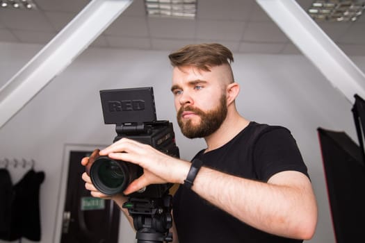 UFA, RUSSIA - 29 FEBRUARY 2020: cameraman works with Red digital cinema cameras. RED is the leading manufacturer of professional digital cinema cameras.