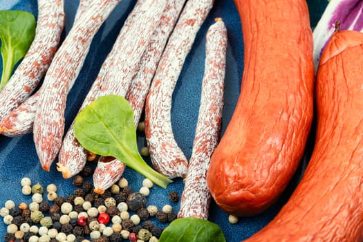 Kabanos sausages, prepared from mixed minced meat. Smoked salami sausage.