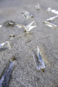 Detail of pieces of glass thrown in the trash, destruction and pollution