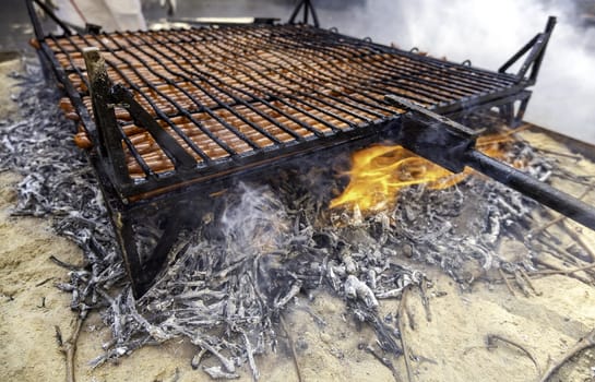 Grilled sausage on barbecue, typical food in Spain, food