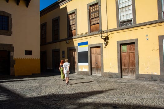 Narrow street with old houses in the historic old town of Las Palmas on the Canary Island of Gran Canaria, Spain, Europe