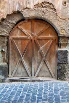 Old wooden door on a house on the Canary Island of Gran Canaria in Spain