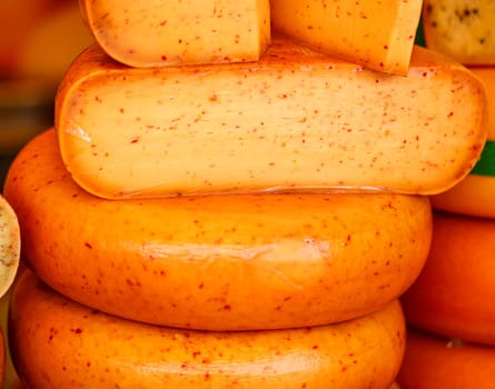 Delicious-looking cheeses in a pile.