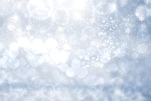 Christmas card template. Abstract festive blue winter christmas background texture with a pastel bokeh lighted xmas baubles and stars. Beautiful card design. Space.