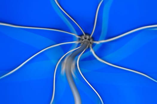 Abstract wavy blue star shape with gray lines.
