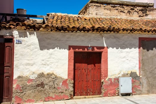 Old wooden door on a house on the Canary Island of Gran Canaria in Spain