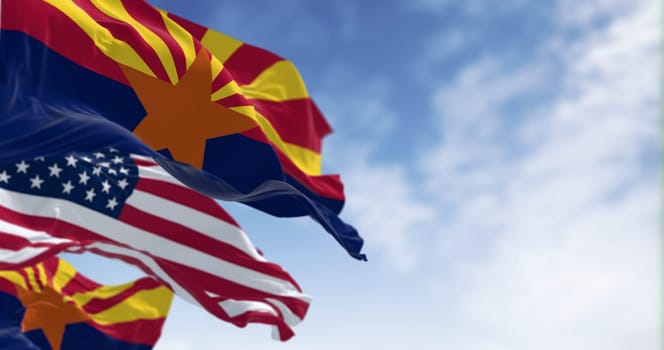 Flags of Arizona and United States waving in the wind on a clear day. Arizona is a state in the Southwestern US. US federate state. 3d illustration render. Fluttering textile. Selective focus