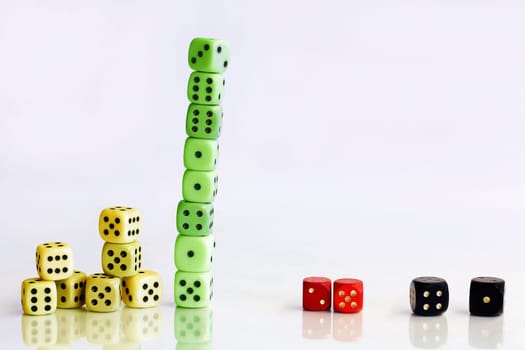 Dice in the colors of the German government red, green, yellow, black