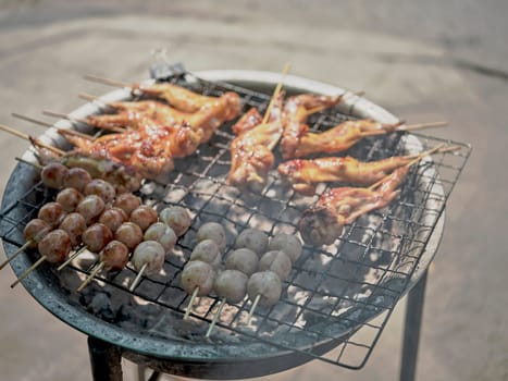 Thai street food in market. Isaan sausages.