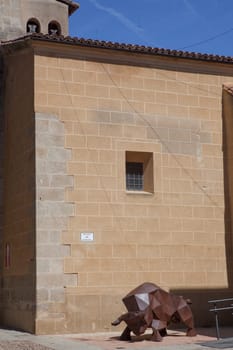 Coria, Spain - Sept 2nd, 2023: Cubist sculpture of bull, Coria, Spain. Unknown artist