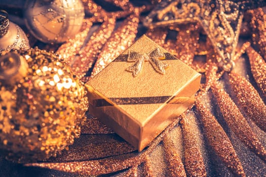 Beautiful Christmas golden deco baubles with gifts, Happy New Year