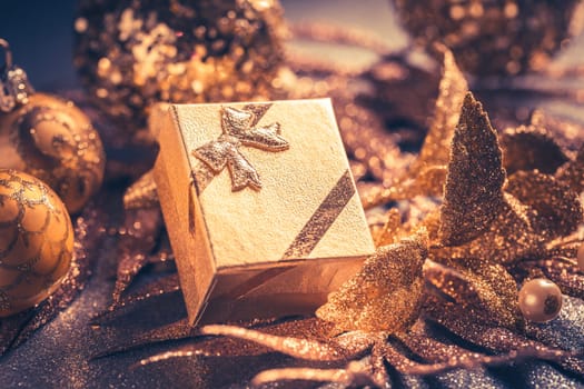Beautiful Christmas golden deco baubles with gifts, Happy New Year