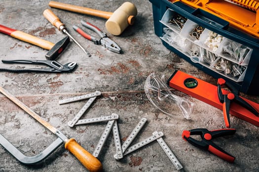 Handyman tool kit with assorted tools, gogles