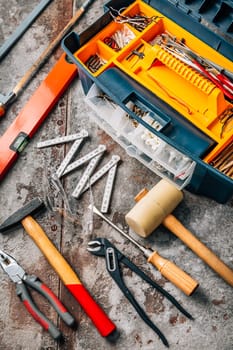 Handyman tool kit with assorted tools, gogles