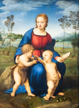 Florence, Italy - June 2022: Madonna and Child with Young St John the Baptist - also named Madonna of the Goldfinch, 1506, by Raffaello Sanzio. Raphael - Renaissance painting masterpiece